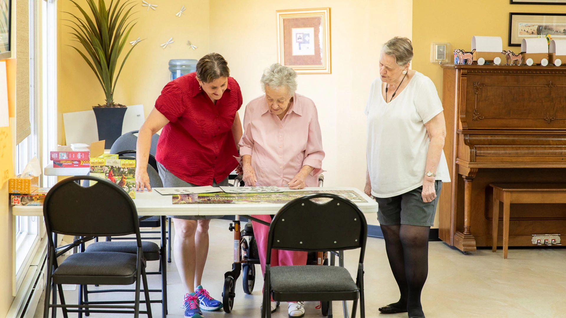 senior ladies doing a puzzle